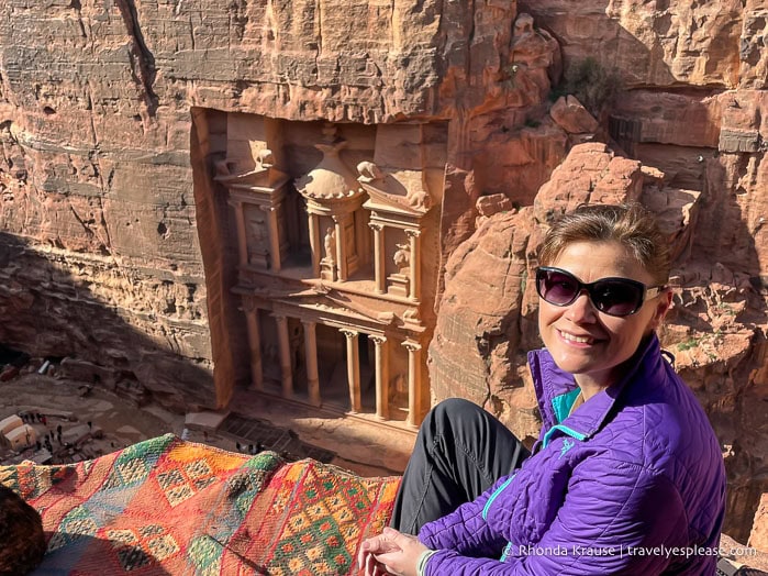 Me sitting at the Al-Khubtha Trail viewpoint with the Treasury in the background.